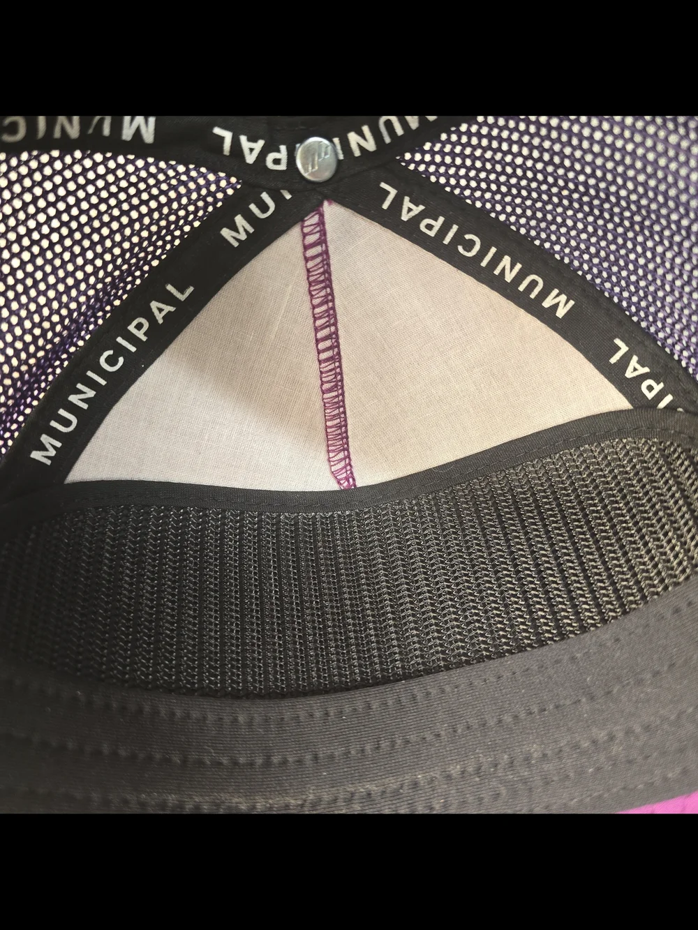 Municipal purple trucker